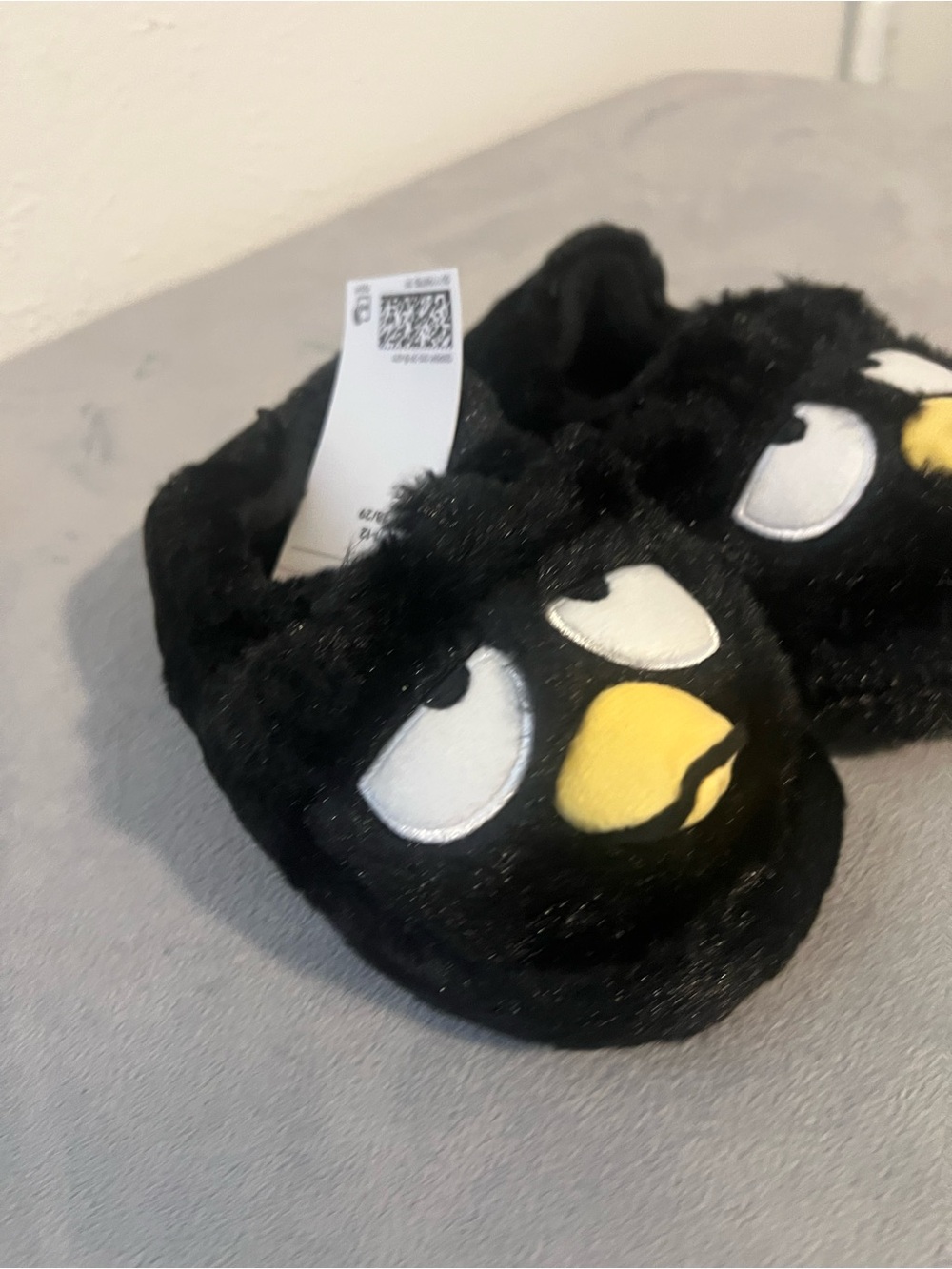 Badtz-Maru
H&M Black Plush Kids Slip-On Character Slippers with Yellow Beak - Picture 7 of 8
